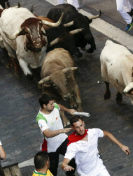 Imágenes del sexto encierro de los sanfermines 2019 protagonizado por toros de Núñez del Cuvillo.