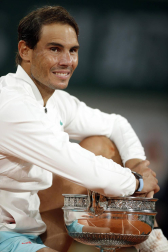 Galería de fotos de la victoria de Rafa Nadal ante Novak Djokovic en Roland Garros. El tenista balear suma su 13º triunfo en París.