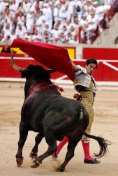 Fotos de la octava y última corrida de la Feria de San Fermín./