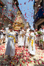 Catholics penitents of the Virgin carry crucifixes decorate with flowers as they take part in a pilgrimage from Tafalla and other villages to the small town of Ujue, northern Spain, Sunday, April 28, 2024. Devotees walk around 25 km (16 miles) from their villages to Ujue in honour of the Virgin. (AP Photo/Alvaro Barrientos)