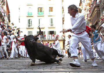 Imágenes del encierro del 12 de julio, con toros de Victoriano del Río