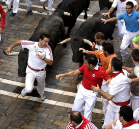 Imágenes del encierro del 12 de julio, con toros de Victoriano del Río