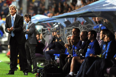 Imágenes del encuentro entre Osasuna y Málaga, disputado este domingo en el estadio de la Rosaleda.