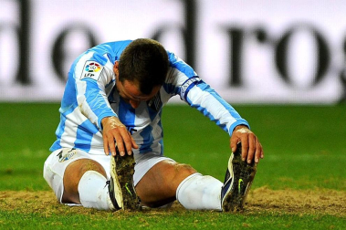 Imágenes del encuentro entre Osasuna y Málaga, disputado este domingo en el estadio de la Rosaleda.
