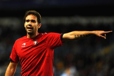 Imágenes del encuentro entre Osasuna y Málaga, disputado este domingo en el estadio de la Rosaleda.