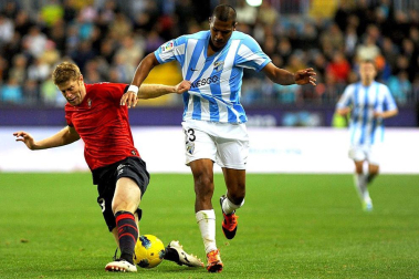 Imágenes del encuentro entre Osasuna y Málaga, disputado este domingo en el estadio de la Rosaleda.