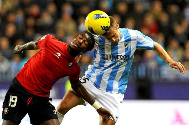 Imágenes del encuentro entre Osasuna y Málaga, disputado este domingo en el estadio de la Rosaleda.