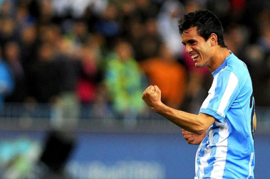 Imágenes del encuentro entre Osasuna y Málaga, disputado este domingo en el estadio de la Rosaleda.