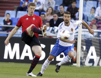 Imágen del partido entre Zaragoza y Osasuna jugado en la Romareda