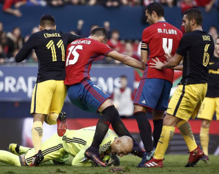 Imágenes del partido disputado este domingo en El Sadar.