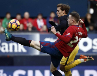 Imágenes del partido disputado este domingo en El Sadar.