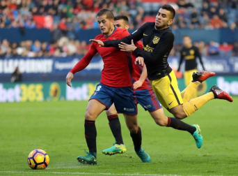 Imágenes del partido disputado este domingo en El Sadar.