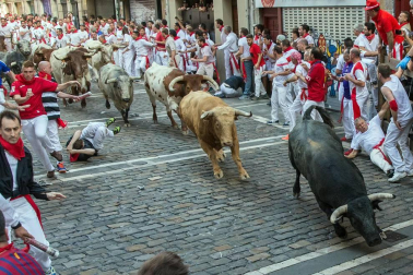 Imágenes exclusivas del primer encierro de 2017 de los fotógrafos de Diario de Navarra.