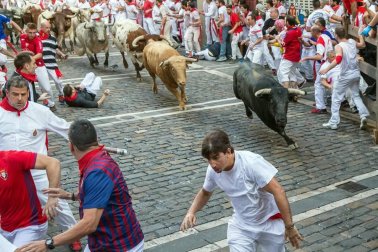 Imágenes exclusivas del primer encierro de 2017 de los fotógrafos de Diario de Navarra.