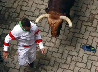 Imágenes del tercer encierro Sanfermines 2017.