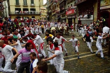 Imágenes del cuarto encierro de San Fermín de Pamplona