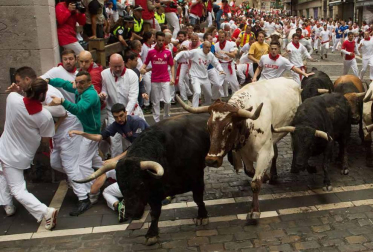 Imágenes del cuarto encierro de San Fermín de Pamplona