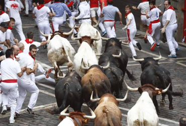 Imágenes del cuarto encierro de San Fermín de Pamplona