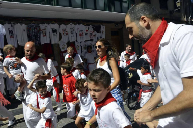 Imágenes del encierro txiki del día 13 de San Fermín