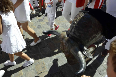 Imágenes del encierro txiki del día 13 de San Fermín