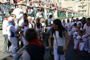 Imágenes del encierro txiki del día 13 de San Fermín