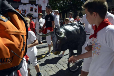 Imágenes del encierro txiki del día 13 de San Fermín