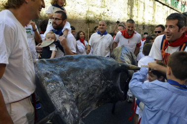 Imágenes del encierro txiki del día 13 de San Fermín