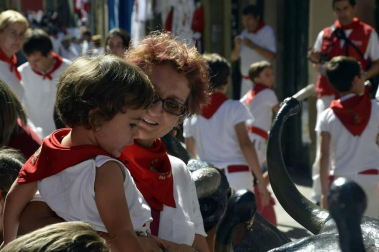 Imágenes del encierro txiki del día 13 de San Fermín