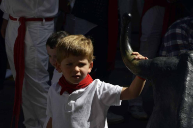 Imágenes del encierro txiki del día 13 de San Fermín