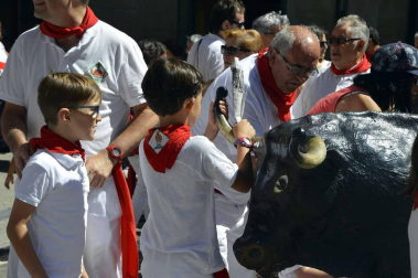 Imágenes del encierro txiki del día 13 de San Fermín