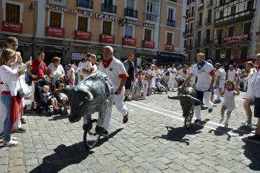 Imágenes del encierro txiki del día 13 de San Fermín