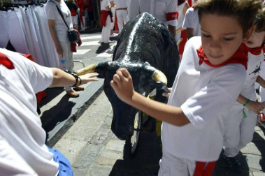 Imágenes del encierro txiki del día 13 de San Fermín
