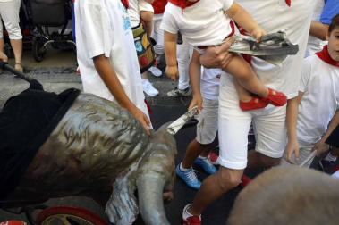 Imágenes del encierro txiki del día 13 de San Fermín