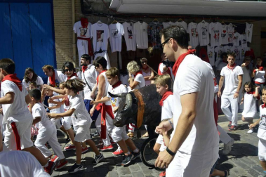 Imágenes del encierro txiki del día 13 de San Fermín
