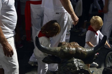 Imágenes del encierro txiki del día 13 de San Fermín
