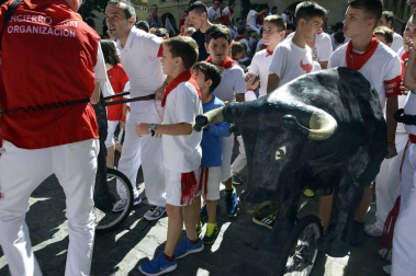 Imágenes del encierro txiki del día 13 de San Fermín
