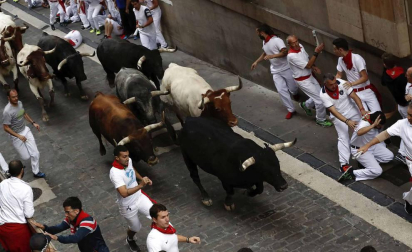 Imágenes del octavo encierro, protagonizado por los Miura