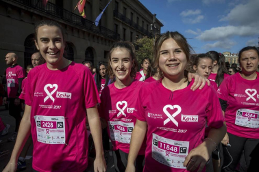Imágenes de la Carrera contra el cáncer de mama, celebrada este domingo en Pamplona.