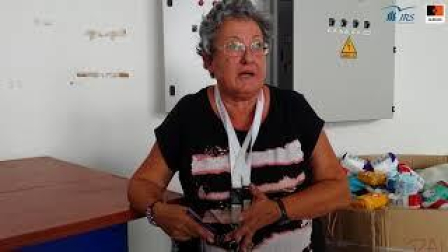 Negia Milian, voluntaria cubana en el almacén de Atenas
