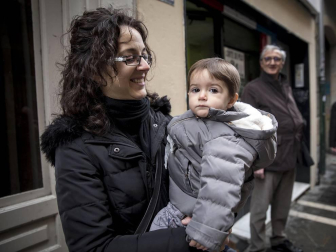 Imágenes del recorrido de los gigantes y cabezudos de Pamplona por San Saturnino