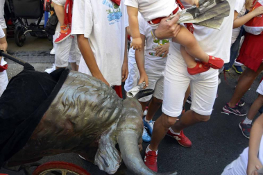 Imágenes del encierro txiki del día 13 de San Fermín