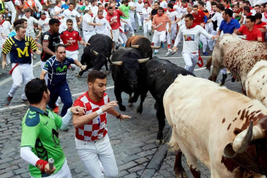 Imágenes del cuarto encierro de los Sanfermines 2018, con toros de la ganadería Fuente Ymbro.