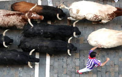 Imágenes del cuarto encierro de los Sanfermines 2018, con toros de la ganadería Fuente Ymbro.