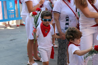 Imágenes de la ofrenda floral a San Fermín en San Lorenzo durante los Sanfermines 2018.