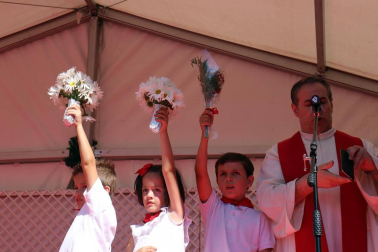 Imágenes de la ofrenda floral a San Fermín en San Lorenzo durante los Sanfermines 2018.