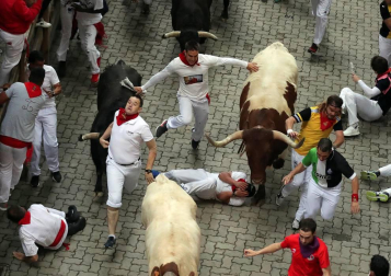Imágenes del séptimo encierro de los Sanfermines de 2018, con toros de la ganadería Jandilla.