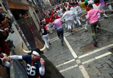Imágenes del séptimo encierro de los Sanfermines de 2018, con toros de la ganadería Jandilla.