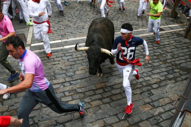 Imágenes del séptimo encierro de los Sanfermines de 2018, con toros de la ganadería Jandilla.