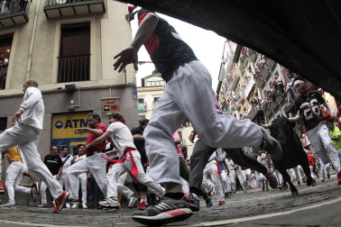 Imágenes del séptimo encierro de los Sanfermines de 2018, con toros de la ganadería Jandilla.