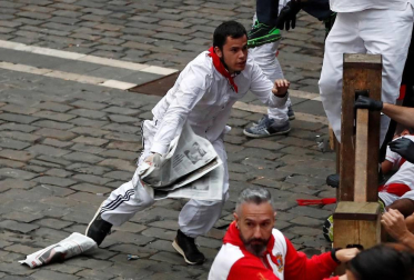 Imágenes del séptimo encierro de los Sanfermines de 2018, con toros de la ganadería Jandilla.